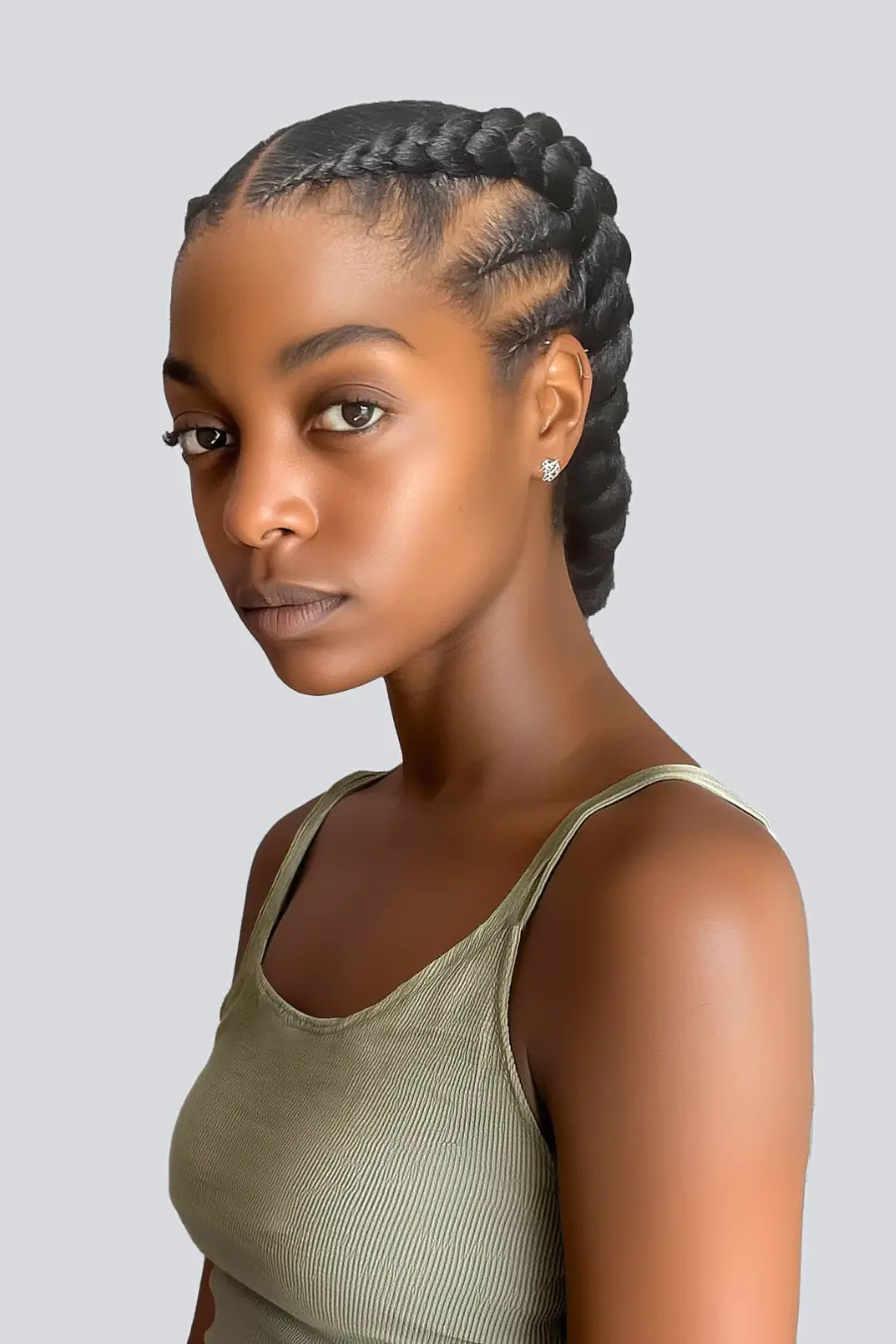 gabby-cornrows-fulani-nyc-la-dc-braider woman standing wearing Gabby braids or two feed-in braids
